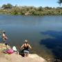 Further along the bank, locals soak in the sun, listen to music and wait patiently for a bite. Largemouth bass, and possibly other varieties of fish, call this place home.