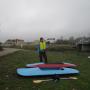 Becca Moeller with her two homemade kayaks, the "Robbie Lynn" and the "Dos Lados." Hilltromper photo.