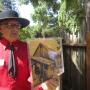 Charlie Kieffer, Friends of Santa Cruz State Parks board member and descendant of the Castro family, with a photo of the Adobe from the 1930s, when it was being used as a barn.