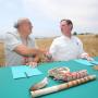 Amah Mutsun Tribal Chairman Val Lopez, left, and Rick Cooper of BLM shake hands after signing the MOU.