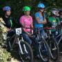Women dirt jumpers prepare to compete at the debut of the Sugar Showdown, presented by Sweetlines Mountain Bike Coaching in 2013 at the Santa Cruz Mountain Bike Festival.