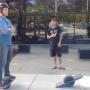 OneWheel creator Kyle Doerksen with a fan outside Future Motion's Santa Cruz headquarters.