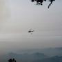 Dec. 17: Another smoky morning helicopter with a very smoky Clear Ridge in the background. We've got two, bigger helo's today!
