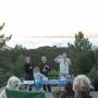 Members of the Fremont Peak Observatory Association raffle telescopes and books to an eager crowd. 