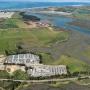 Aerial view showing the Pick-n-Pull's proximity to Elkhorn Slough. Photo by Joel Avila/Hawkeye Aerial Photography.