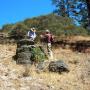 Prof. emeritus Robert Garrison and historian Frank Perry next to the largest remaining "Ruins" chimney. Photo courtesy Hilde Schwartz.