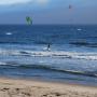 Strong northwesterly winds make Waddell Beach a major kitesurfing destination. (It glasses off, too, so surfers can have a shot.) Photo by Joe Gomez.