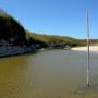 Tall rods measure the salinity levels in the brackish lagoon.