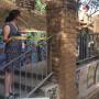 Artist and project adviser Kathleen Crocetti on the new staircase. At right is Chris Spohrer of State Parks.