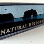 Michael Schwab's iconic parks designs have found their way to magnets, hoodies, mugs and even tins of chocolates.