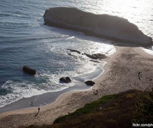 Looking down on long Greyhound Rock from the Highway 1 bluffs. Photo by Finitor on flickr.