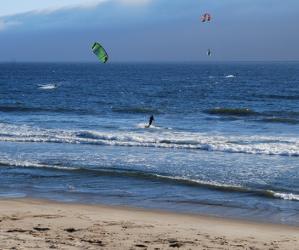 Strong northwesterly winds make Waddell Beach a major kitesurfing destination. (It glasses off, too, so surfers can have a shot.) Photo by Joe Gomez.