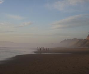 Wisps of evening fog settle over the sand at Manresa State Beach. Hilltromper photo.