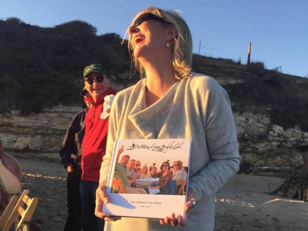 This nice lady from Beaumont, TX, has been to Outstanding in the Field events for something like seven years in a row, and has a book to prove it.