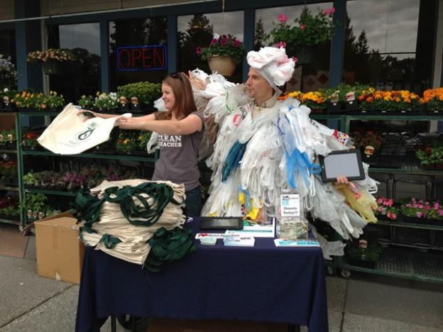The Save Our Shores Bag Monster hands out reusable bags. Photo courtesy Save Our Shores.
