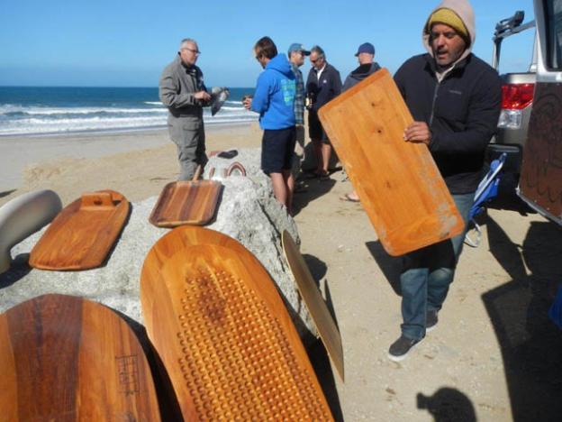 Brian Himilan of Longship Designs holding the only board he needs to travel the world.
