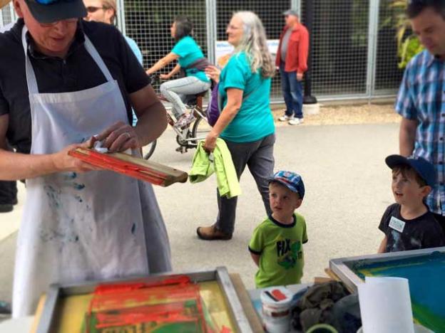 Ross and friends 'live-printing' at the Santa Cruz Wharf celebration last summer.