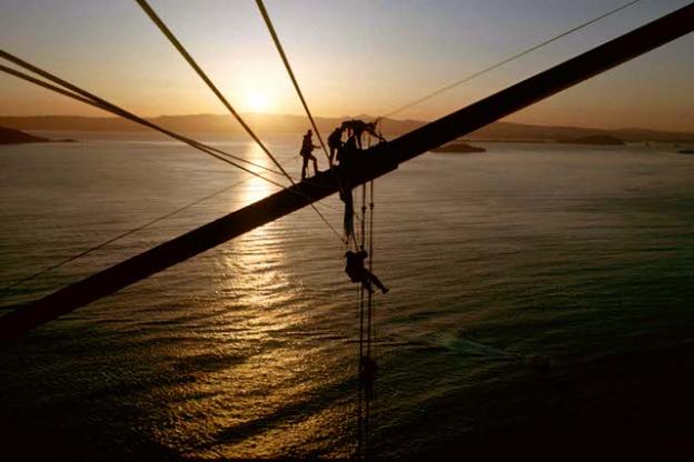 Protesters attempted to unfurl a banner over Golden Gate Bridge in 1990. Greg King said, “This action was the unofficial kick-off to Redwood Summer, an intense series of protest activities. Federal officials meanwhile were orchestrating arrests of our support group, who were standing in legal areas on the ground, breaking no laws. They somehow knew who the group members were.” King was also arrested. Photo courtesy Greg King.