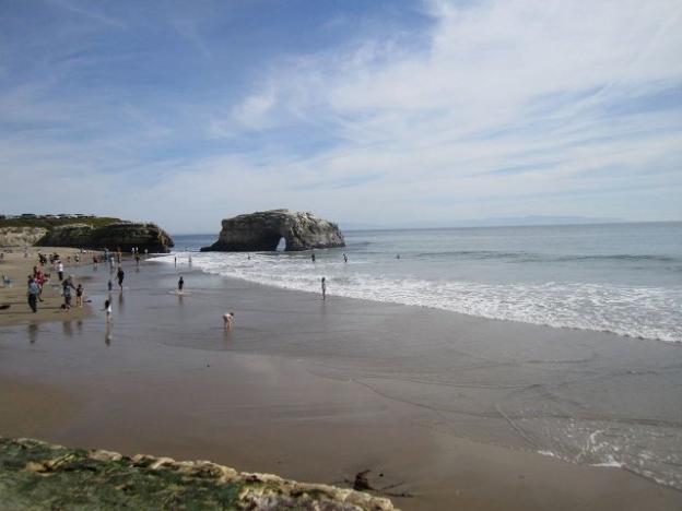 Natural Bridges at low tide is a very popular place—even in February.  Photo credit: Hilltromper.