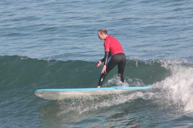 Ryan Smith, new surfer extraordinaire, carves a line. (Chip Scheuer)