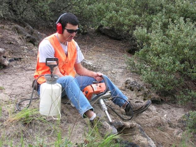 Former earth sciences undergraduate Carlos Bazan drilling out a core from a smaller chimney for geochemical analysis. Hilde Schwartz photo.