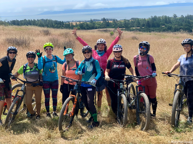 Happy bikers on a Girls Rock Monthly Ride. Photo © Mary Pat Davey