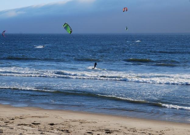 Strong northwesterly winds make Waddell Beach a major kitesurfing destination. (It glasses off, too, so surfers can have a shot.) Photo by Joe Gomez.