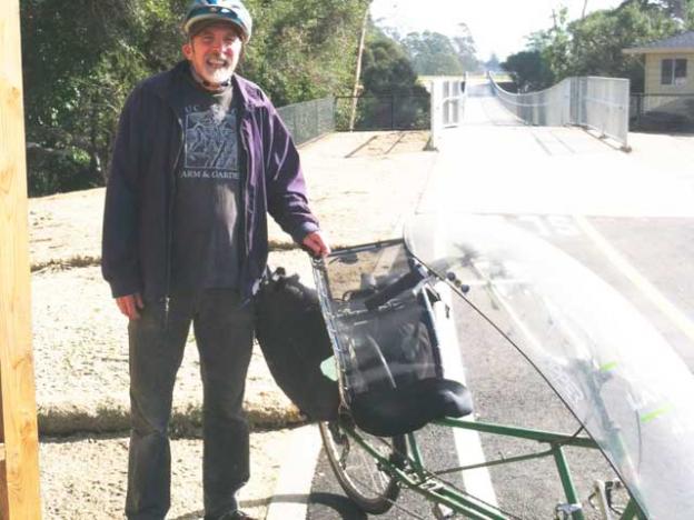 Ken Foster with his beloved recumbent bicycle. 
