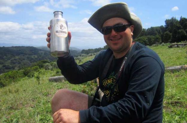Ken Collins of the Elkhorn Slough Foundation flashes his Hilltromper sticker while hydrating.