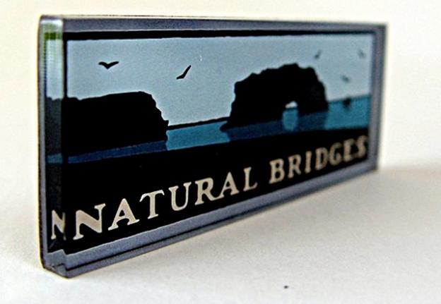 Michael Schwab's iconic parks designs have found their way to magnets, hoodies, mugs and even tins of chocolates.