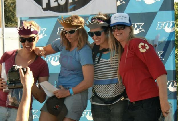 Girls playing around on the podium.