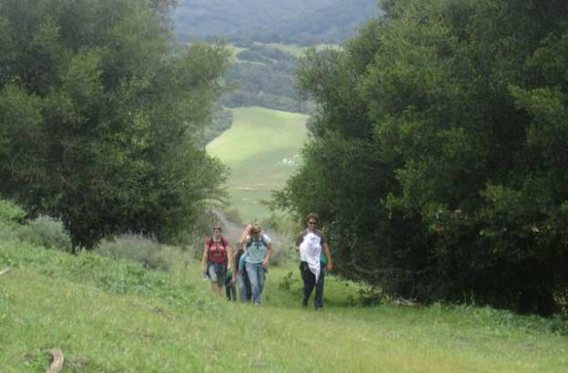 A family out for a steep Saturday stroll. 