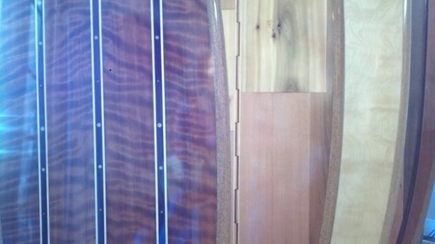 Closeup of three Ventana Surf Co wood surfboards at Stripe MEN. Hilltromper photo. 