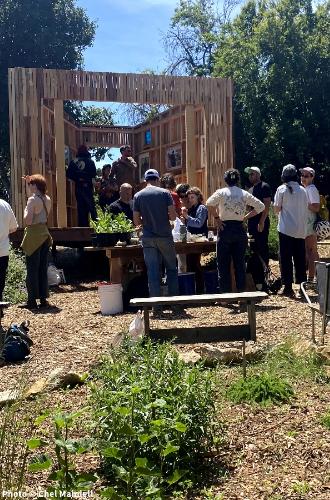 Volunteers prepare The Greenhouse Project space for the Jewish New Year. Photo credit: Chel Mandell