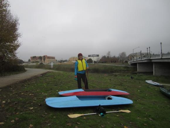 Becca Moeller with her two homemade kayaks, the "Robbie Lynn" and the "Dos Lados." Hilltromper photo.