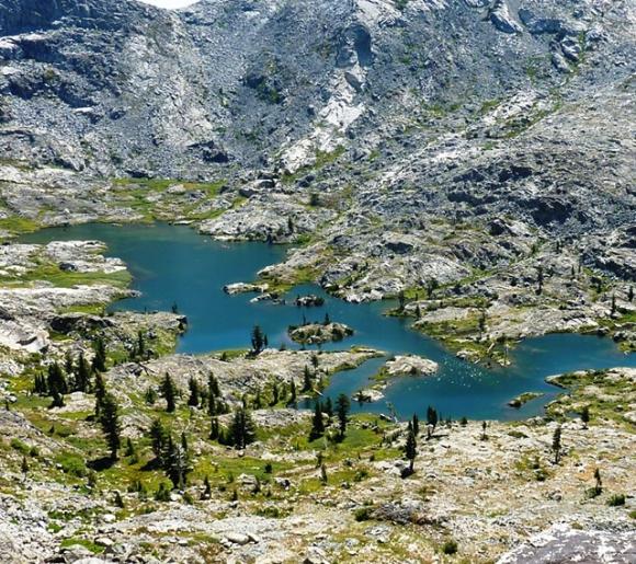 Desolation Wilderness, just south of Lake Tahoe in the Sierra Nevada, draws throngs to picturesque spots like Island Lake. Photo by Brooke Wright.
