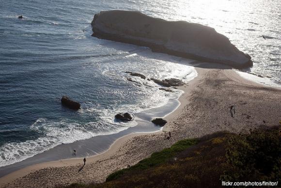 Looking down on long Greyhound Rock from the Highway 1 bluffs. Photo by Finitor on flickr.