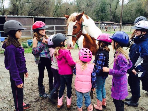 Miller in his element: entertaining a crowd of young ladies. Photo courtesy Lindsay Overton.