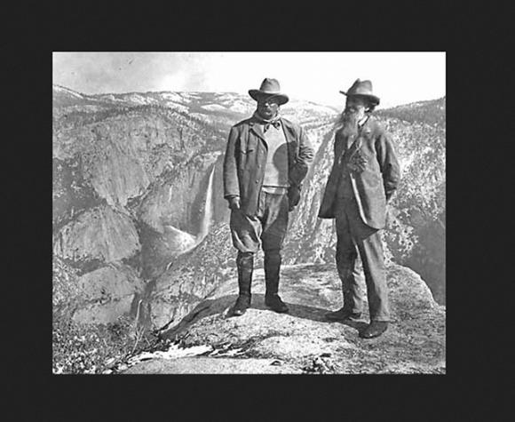 President Roosevelt and John Muir at Glacier Point in 1903. Their impromptu three-day camping trip led to the federal government taking back Yosemite Valley and Mariposa Grove from the state of California. National Park Service Historic Photo.