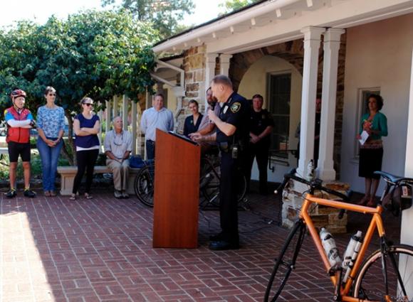 Scotts Valley Police Chief John Weiss addresses a crowd at City Hall about enforcing California's new Three Foot Law. Photo by Diane Terry.