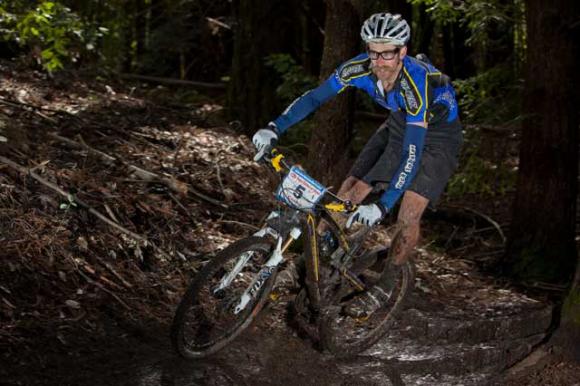 Santa Cruz-based pro racer Scott Chapin cruises through a turn in the inaugural Santa Cruz Super Enduro last October.